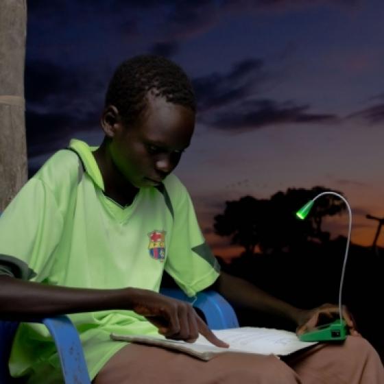 boy reading in sudan