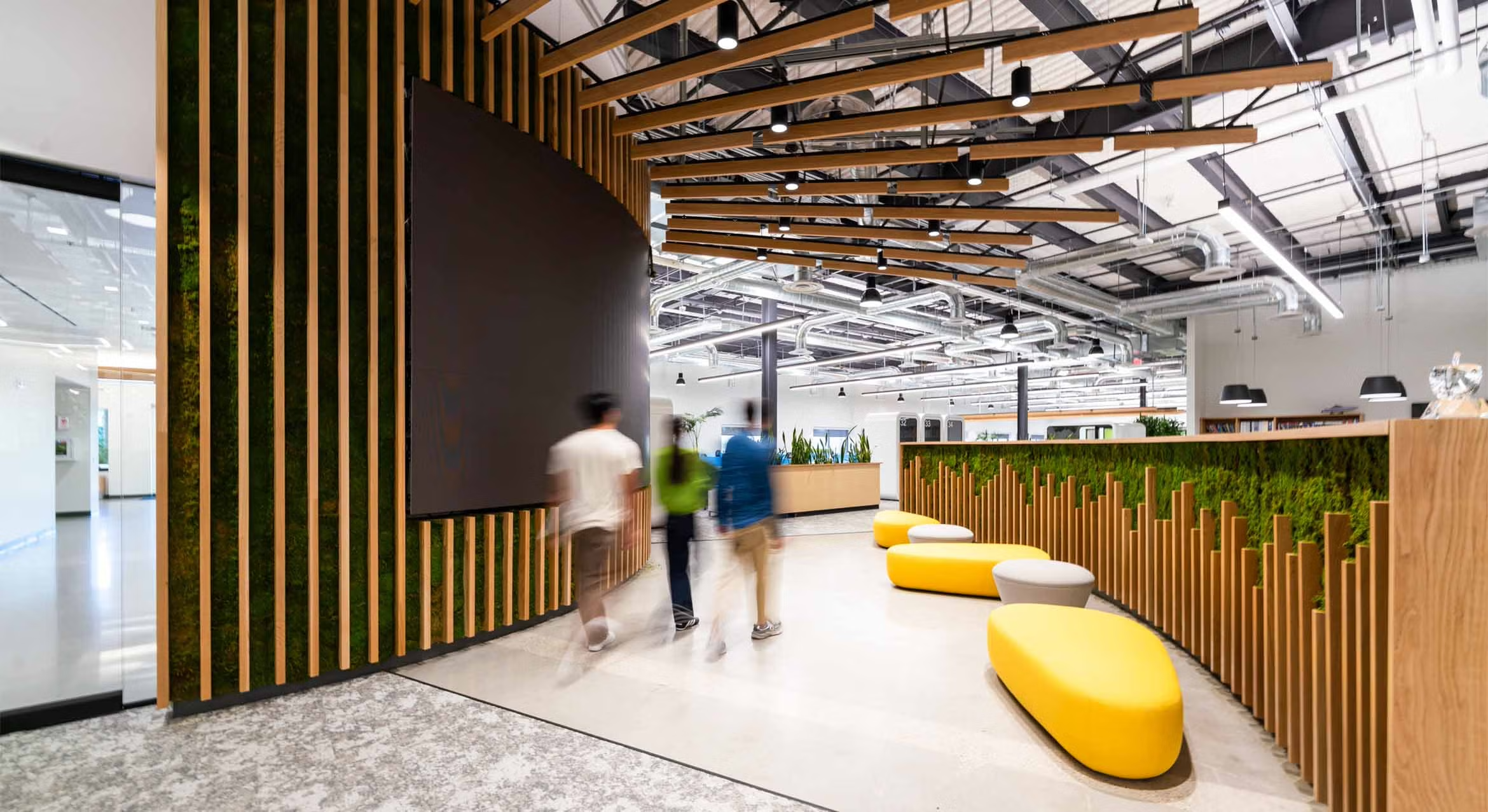 Image of people walking through the OASIS research building 