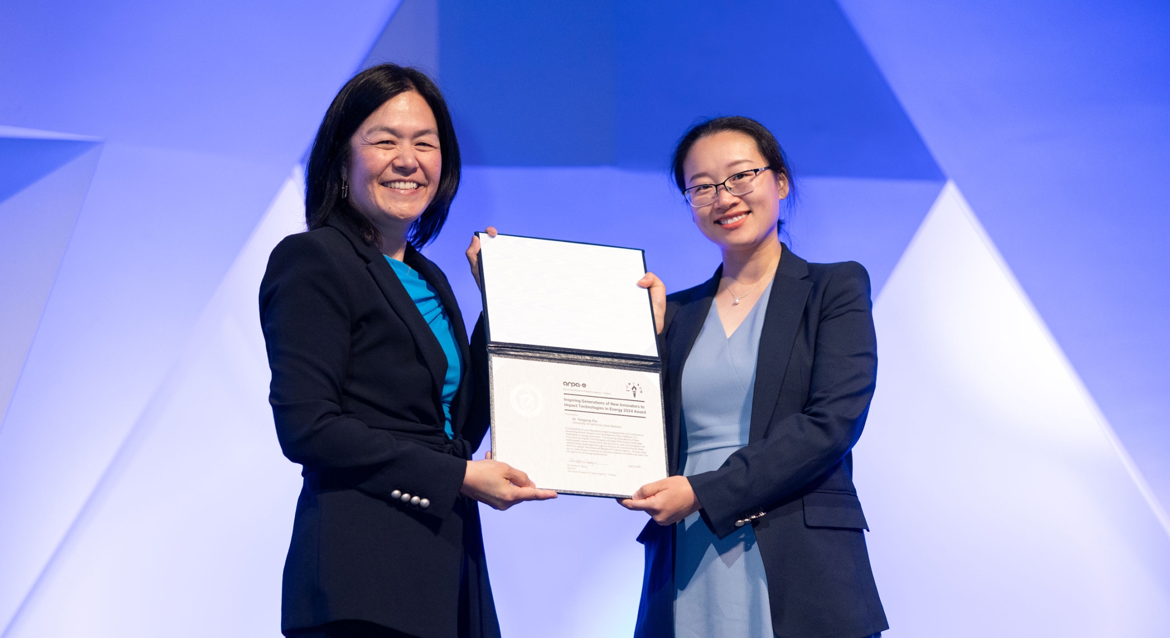 Yangying Zhu (right), assistant professor in the UCSB Mechanical Engineering Department, receives her award certificate from ARPA-E Program Director Dr. Evelyn Wang at the National Academy of Sciences, in Washington, D.C.