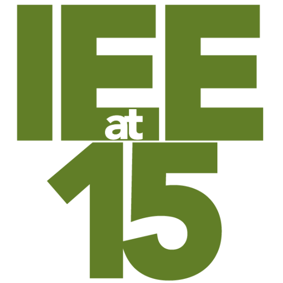 The words, "IEE at 15" in bold font. "IEE" and "15" are in green font; "at" is inlaid in white font.